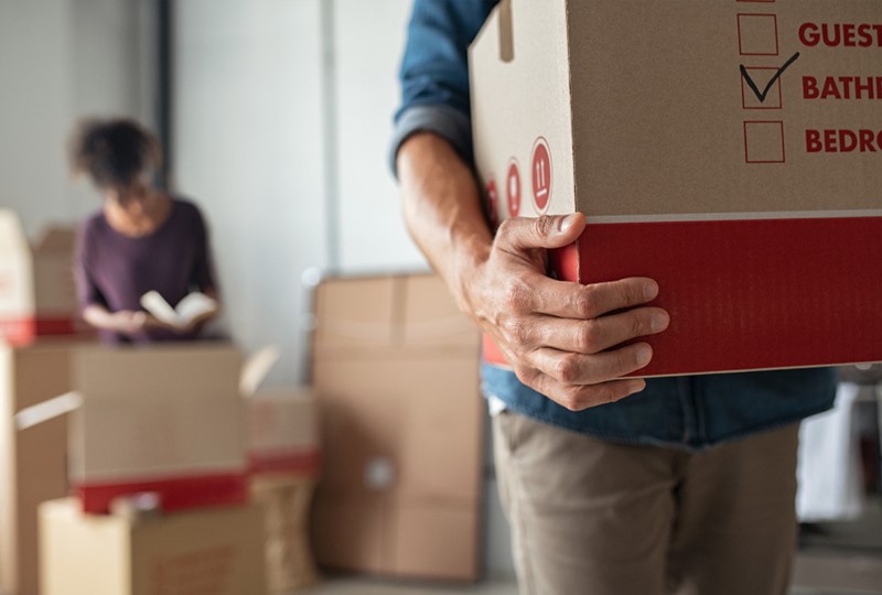 buyers unpacking moving boxes