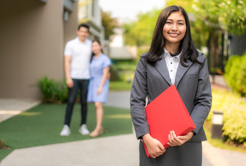 Agent showing first-time buyers a home