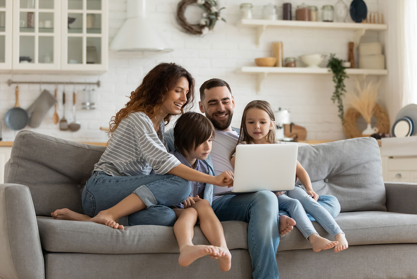 Family attending a virtual housewarming party